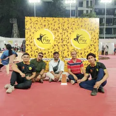 The coaching team sitting proudly with our award at the MCF Fun Fiesta. Moments like these motivate us to keep pushing the boundaries of sports and community engagement.