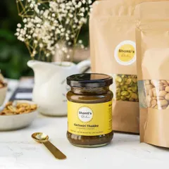This is my Kothmiri Thokku, a versatile coriander chutney that is spicy, tangy, and a little sweet. I make it with fresh coriander and my own blend of spices. You can spread it on a roti, mix it with rice, or use it as a dip for my crisp murukkus.