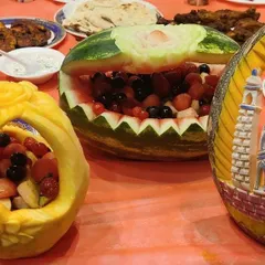 We believe presentation is just as important as taste. Our team includes artists who create stunning, intricate fruit and vegetable carvings that serve as beautiful, edible centerpieces for your event.