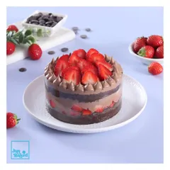My Chocolate Strawberry pull-me-up cake is a seasonal showstopper. It features layers of chocolate cake, fresh strawberries, and is waiting for a cascade of chocolate ganache.