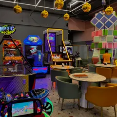 Our cafe and arcade area is the perfect spot for parents to relax while older kids enjoy games like Magic Hockey and racing simulators.