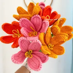 Here is a close-up look at my open-petal tulips. I love the vibrant mix of pink, orange, and yellow in this bunch, showing the detailed stitch work that goes into each handmade flower.