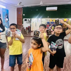 Everyone raising their branded mugs. It’s a small token, but it helps them feel like they are part of the Yog Mantra family.