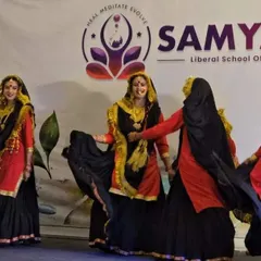 A vibrant cultural performance during our Himachal retreat. We believe in celebrating local traditions, which adds a rich layer of joy and connection to the spiritual experience.