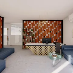 A reception and waiting area designed to make a strong first impression. The space features a custom-designed desk, a bold terracotta-colored partition with mirrored accents, and comfortable seating for visitors.
