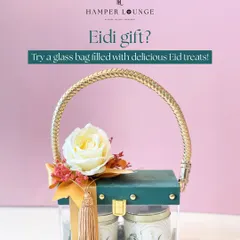 Looking for a unique Eidi gift? This elegant glass bag, with its golden handle and tassel, is filled with delicious Eid treats and makes for a very stylish and modern present.