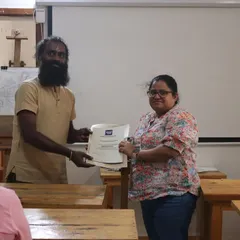 Celebrating another student's achievement. Earning a certificate at our Gurukul is a mark of true commitment to the artistic journey.