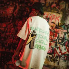 A shot from a collaboration with Superkicks and Lefthander. This photo, taken against a heavily tagged wall, captures the authentic street culture that my art comes from.