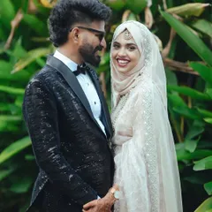 The look of pure happiness. I love capturing the natural smiles and easy comfort between a couple on their wedding day, surrounded by lush greenery.