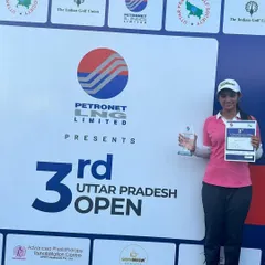 A Student Holding Her Winner's Trophies: Another shot of our champion, Shreshtha Shukla, celebrating her victory at the 3rd UP Open. We are incredibly proud of her outstanding performance and hard-earned success.