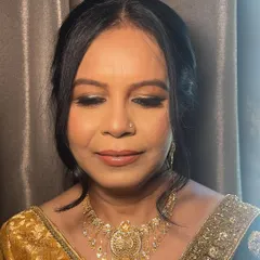 A close-up of the makeup for my client, Rama. I used a dash of shimmer and a smudged liner to define her eyes, creating a remarkable glow for her nephew's wedding.
