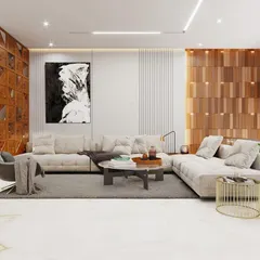 This living area combines modern design with spiritual elements, featuring a dedicated corner for a pooja space, seamlessly integrated with a custom wooden jaali screen. The open-plan layout is furnished with a plush sofa and contemporary art.