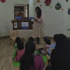 Using a Kamishibai, a traditional Japanese storytelling box, to enhance visualization. This tool helps focus the children's attention and brings a unique, magical element to the story.