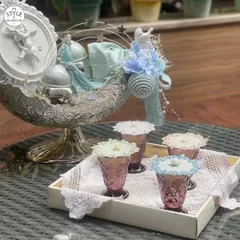 Here is another way I style my embellished glass covers. Placed on a tray with colorful glasses, they create a beautiful and cohesive look for serving welcome drinks to your guests.