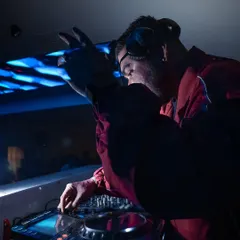 A close-up shot of me working the controls during my 10-year anniversary set. The gear is an extension of my creativity.
