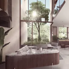 We designed this living space around a central glass courtyard, making a single tree the focal point of the room. This brings the calming presence of nature into the very heart of the home, blurring the lines between interior and exterior.