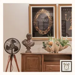Here is another view of the wooden cabinet, showcasing its ample surface space and the warm, inviting atmosphere it helps create. It's a functional piece that anchors the room's decor.