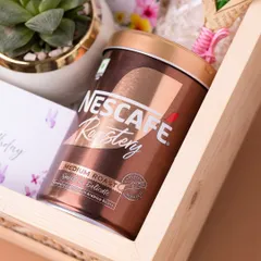 A can of Nescafe Gold Roastery coffee, selected for a coffee lover's birthday hamper. I always tailor the contents to the recipient's specific tastes.
