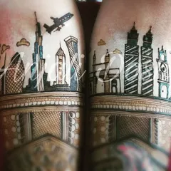 This bride was an air hostess, and her story connected two great cities. I designed this unique piece featuring the Dubai and Mumbai skylines.