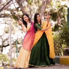 My sister and I, ready for a performance. These photoshoots are a great way for us to capture our partnership and the beautiful costumes that are part of our artistic identity.