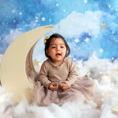 I was over the moon creating this dreamy setup for a sweet sitter session. My studio is filled with props like this to bring your creative ideas to life, making each toddler portrait session a unique adventure.