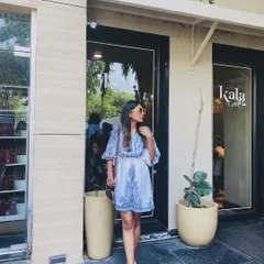 A blue and white printed dress that's perfect for a lunch date in Delhi. Paired with simple flats and sunglasses, it's a complete and easy-going look.