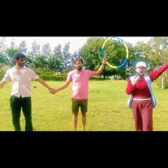 Using simple props like a hula hoop, I facilitate a team building game for a website design company. These activities are designed to improve communication and problem solving in a relaxed, outdoor setting.