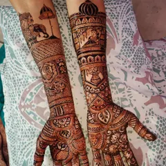 Your story, told in henna. This custom bridal design features a traditional doli (palanquin) scene, majestic elephants, and sacred kalash motifs, making the mehndi truly personal and unique to the bride's journey.