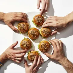My mini sliders have a reputation for disappearing fast. This shot captures it perfectly. I bake the buns fresh and stack them with flavorful patties and crisp veggies. They are a guaranteed hit at any party, and I promise no one can stop at just one.