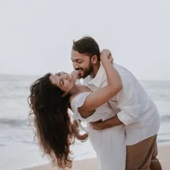 The carefree spirit of love captured during a pre-wedding shoot on the beach. These sessions are all about celebrating your connection in a relaxed, natural setting before the big day.