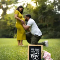 "And then there were three." Using a simple chalkboard sign in a beautiful outdoor setting is a classic and charming way to announce that your family is growing.