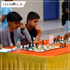 Two young players deeply focused on their match during the Chess Carnival. The competitive spirit is alive and well in our budding champions.