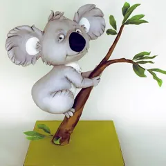 A gravity-defying Koala cake, where the adorable, fully-sculpted koala appears to float while clinging to a tree branch.