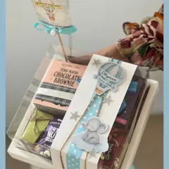 This hot air balloon themed favor is perfect for a first birthday. The little elephant detail and personalized tag make it a sweet and memorable gift for guests.