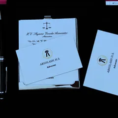 My professional identity as an advocate. My business cards represent my commitment to providing clear, reliable, and sophisticated legal services.