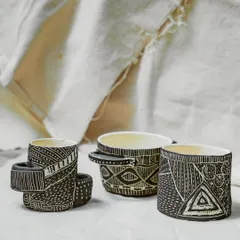 A closer look at the sgraffito-decorated cups from our Foundation course. Each line is carefully carved to reveal the clay body underneath, creating a striking contrast and a tactile quality that makes each piece special.