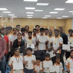 The rewarding feeling of completing a camp session. Here is a group of proud campers with their certificates and medals, celebrating their hard work and newfound skills.
