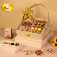 This charming hamper basket combines the best of both worlds. It includes a section of my finest baklava and fusion sweets alongside compartments of premium almonds, pistachios, and cashews.