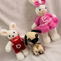 This set of custom toys was made for a client, featuring two plush bunnies in different outfits and a cute little pug. I can create entire families of toys, including your beloved pets.