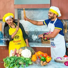 Capturing the fun, candid interactions between a couple is key to a successful pre-wedding shoot. Here, Prashast and Yamini share a laugh during their cooking-themed session.