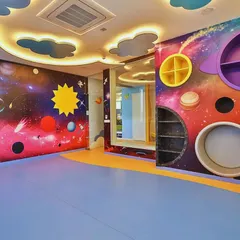For the Supaksha Early Learning Habitat, we created a universe of imagination. This space-themed room features custom-built shelving and vibrant wall murals, designed to be an interactive and inspiring environment where children can learn and explore through play.