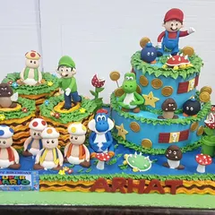 It's-a me, Mario! This massive 15 kg Super Mario themed cake brings the entire game to life with multiple tiers, levels, and all your favorite characters like Mario, Luigi, and Yoshi, all handcrafted from fondant.