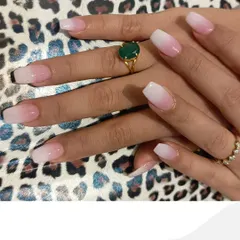 This angle showcases the clean lines and flawless gradient of the pink and white ombre design. We ensure every nail has a consistent and smooth color transition for a professional finish.