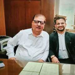 Learning from experienced mentors is invaluable. Pictured here with a senior advocate, I value the wisdom and strategy that has been passed down to me.