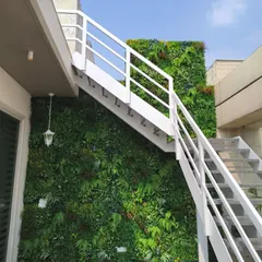 This installation in Punjabi Bagh, Delhi, shows how a green wall can transform a functional space like an outdoor staircase. The UV protective foliage ensures it stays green and vibrant for years.