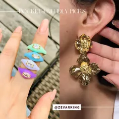 Fun and colorful accessories can instantly brighten up your look. These enamel rings and floral earrings are from a brand that offers trendy, statement pieces at a great price point.