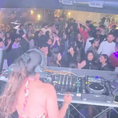 The view from my console as the crowd dances to the beat. I love seeing the dance floor packed and feeling the collective energy of a great night.