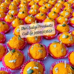 A large batch of Boondi Ladoo candles, each one handcrafted. In my workshops, you'll learn how to produce these consistently and beautifully.