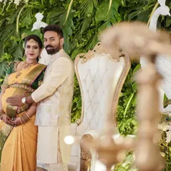 A lovely photo of the parents-to-be at their baby shower. I was honored to provide the traditional decor that served as the backdrop for their special moments.