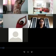 You can practice with me from anywhere. This is a glimpse of an online corporate yoga session, where we focus on simple stretches and breathing exercises that anyone can do from their chair or mat at home.